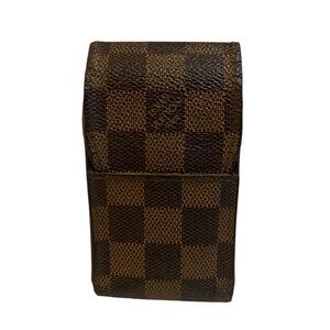 Louis Vuitton Etui Cigarette Case in the classic Damier Ebene canvas.